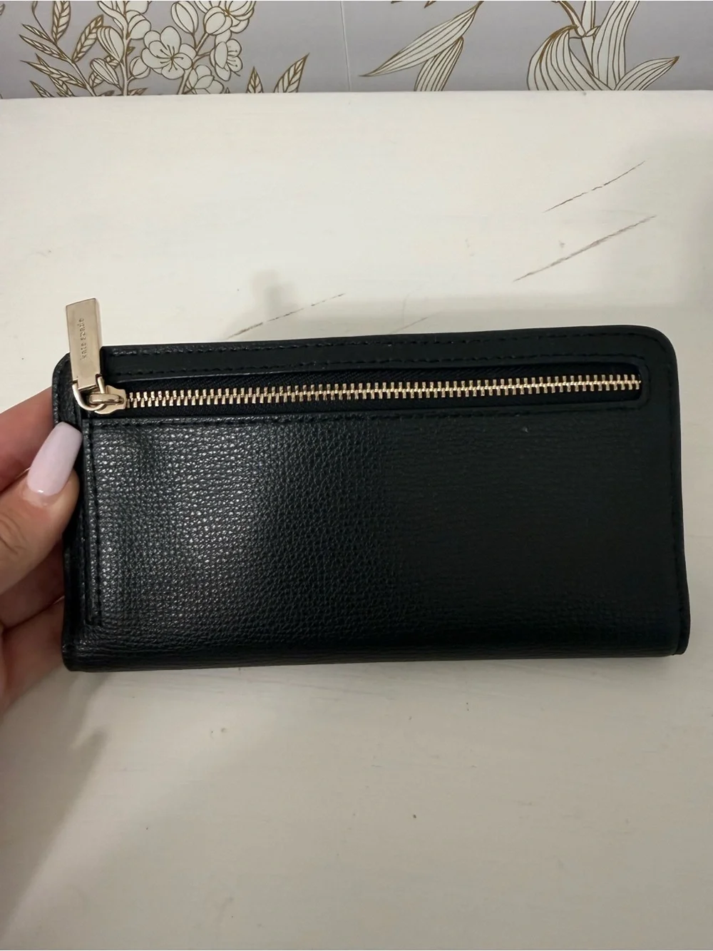 kate spade black leather zip-around continental wallet with gold logo